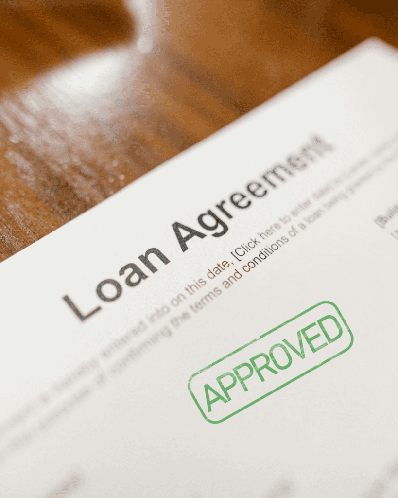 Approved stamp mock-up on loan agreement document. Graphic design.