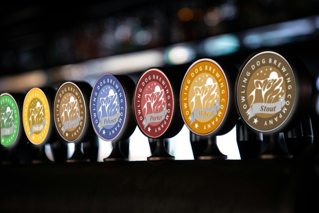 Howling Dog Brewing logos mock-up on beer taps. Logo design.