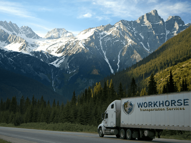 Workhorse Transportation Services truck mock-up 1 on mountain road. Branding design.