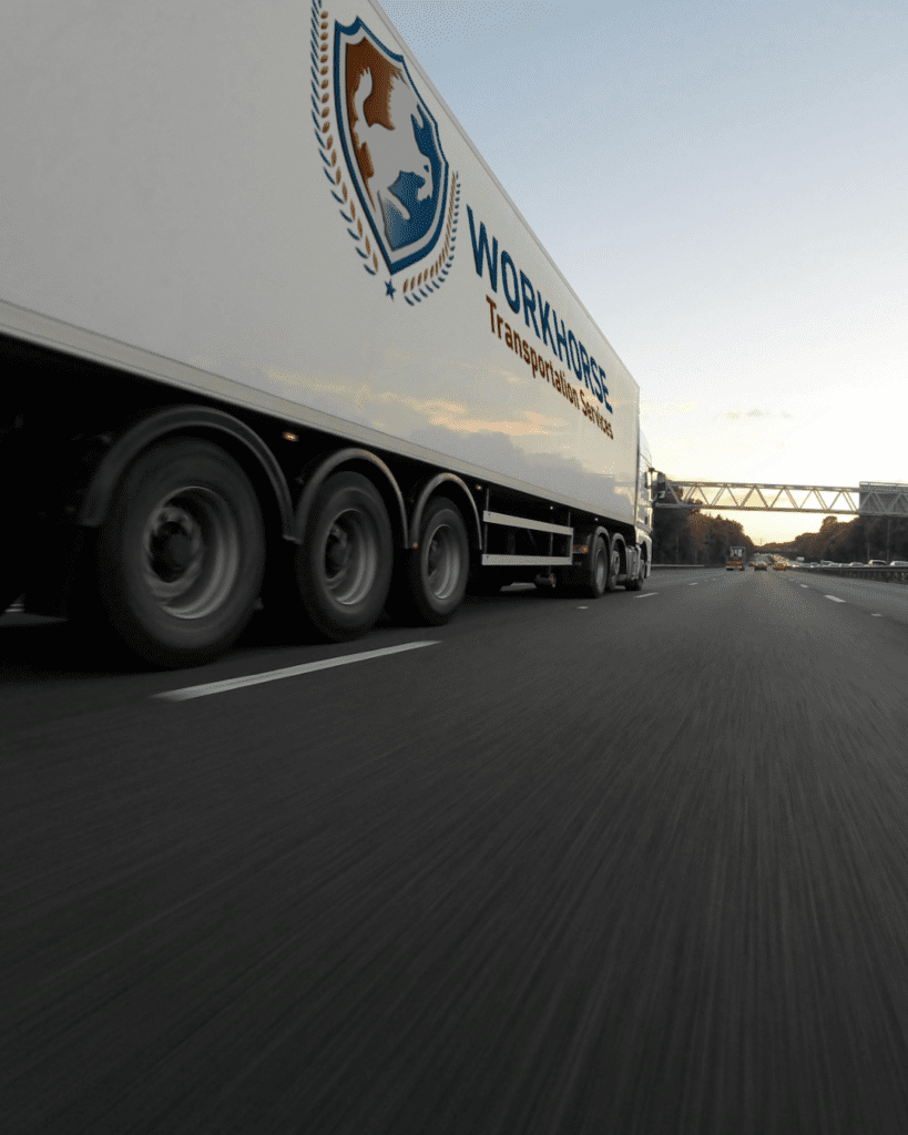 Workhorse Transportation Services truck mock-up 2 on highway. Branding design.