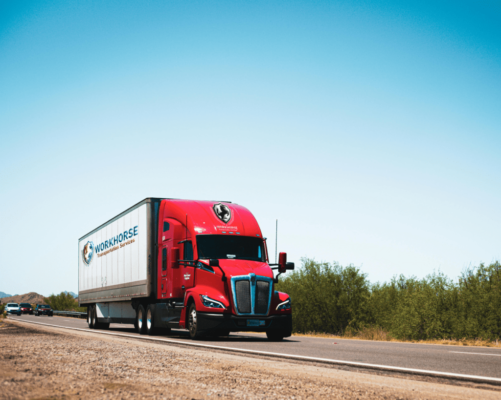 Workhorse Transportation Services truck mock-up 4 with red cab. Branding design.
